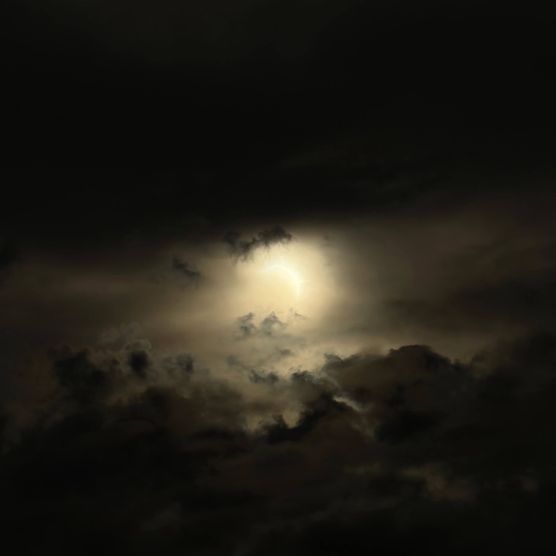 The cloudy partial eclipse seen from the observatory.